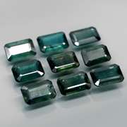 Heated only! 5.32ct blue green sapphire set