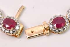 Stunning 8.55CTW Oval Cut Ruby Bracelet & 1.21CTW Diamond in Gold Plated Sterling Silver