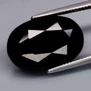 Elegant 12.71ct silky black Loas Tektite