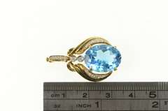 14K Yellow Gold Oval Blue Topaz Diamond Accent Elaborate Pendant
