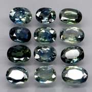 Heated only! 3.98ct blue green sapphire set