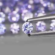 Heavy flashing 3.32ct diamond cut Tanzanite set