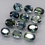 Heated only! 3.98ct blue green sapphire set