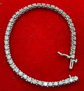 14K WHITE GOLD AND 4.00 CARATS OF DIAMONDS BRACELET.