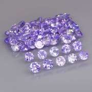 Heavy flashing 4.57ct diamond cut Tanzanite set