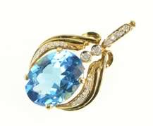 14K Yellow Gold Oval Blue Topaz Diamond Accent Elaborate Pendant