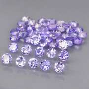 Heavy flashing 4.07ct diamond cut Tanzanite set