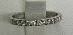 BRAND NEW LADIES 18K WHITE GOLD AND DIAMOND BAND