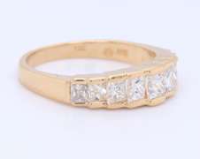 Dazzling Yellow Gold Princess Cut Diamond Band