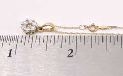 Fancy Floral Diamond Pendant in Yellow Gold