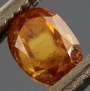 Stunning .33ct oval cut amber Diamond