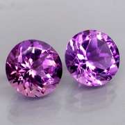 Glittering 6.99ct violet Amethyst solitaire pair