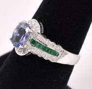 Sparkling Purple Tanzanite And Emerald Ring In 14K White Gold