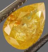 Rare .40ct pear cut golden Diamond