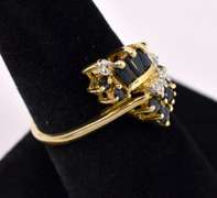 Striking Blue Sapphire with Diamonds Ring in 14K Yellow Gold