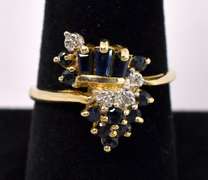 Striking Blue Sapphire with Diamonds Ring in 14K Yellow Gold