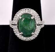Brilliant 6.50CTS Oval Shaped Cabochon-Cut Natural Emerald & 1.50CTW White Sapphire Ring in Sterling Silver