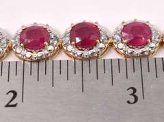 Stunning 8.55CTW Oval Cut Ruby Bracelet & 1.21CTW Diamond in Gold Plated Sterling Silver