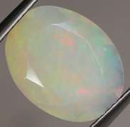 Full cover! 2.63ct rolling floral flashing Welo Opal