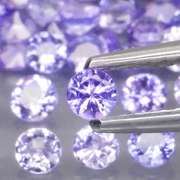 Heavy flashing 4.07ct diamond cut Tanzanite set