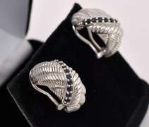 Blue Topaz Hoop Earrings In Sterling Silver