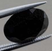 Sultry 3.40ct blue black oval cut Sapphire