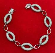 CERTIFIED 14K WHITE GOLD AND DIAMOND LINK BRACELET.
