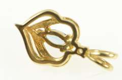 14K Yellow Gold Marquise Blue Topaz Diamond Accent Heart Pendant