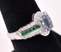 Sparkling Purple Tanzanite And Emerald Ring In 14K White Gold