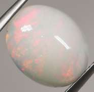Beautiful 2.40ct rolling floral flashing Welo Opal