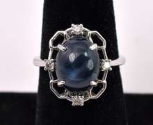 Stunning 7.01CTS Blue Cabochon-Cut Star Sapphire & 0.17CTW Diamond Ring in Sterling Silver
