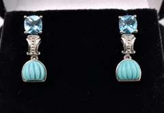 Blue Topaz Dangle Earrings In Sterling Silver