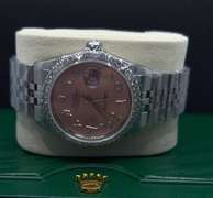 PINK ROLEX OYSTER PERPETUAL DATEJUST WITH AFTERMARKET DIAMOND BEZEL (2.45 CT) IN STAINLESS STEEL