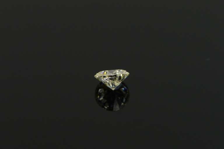 GIA 0.48 Ct Round Brilliant Cut M Color SI2 Clarity Diamond