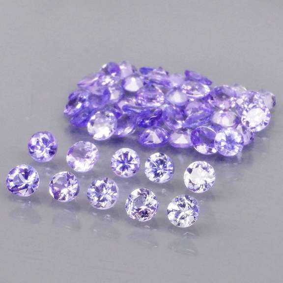 Heavy flashing 4.22ct diamond cut Tanzanite set
