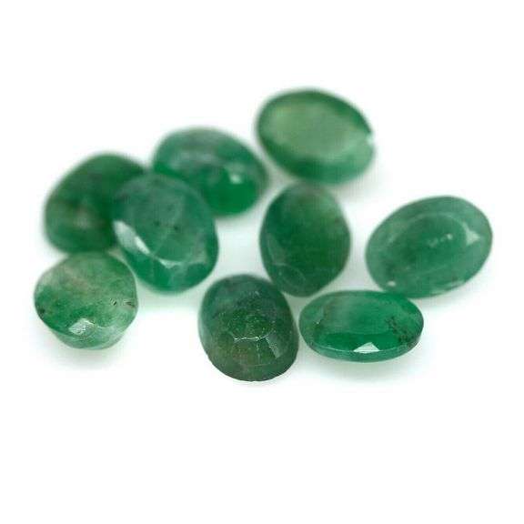Rich emerald green 6.53ct 9pc emerald set