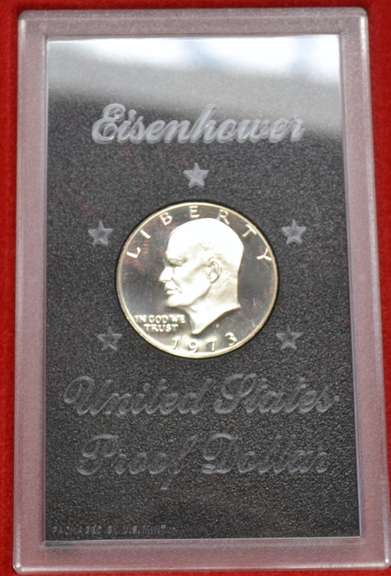 8 Brown Box Ike Silver Dollars.