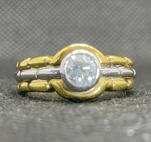TWO TONE BEZEL SET ROUND DIAMOND ENGAGEMENT RING IN 18K YELLOW GOLD (0.65 C.T. T.W.)