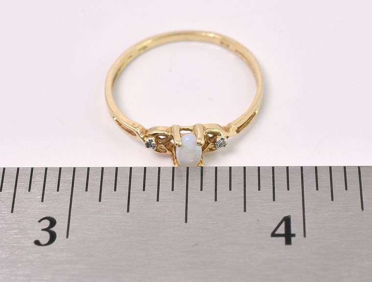 Delicate Opal Ring In Yellow Gold