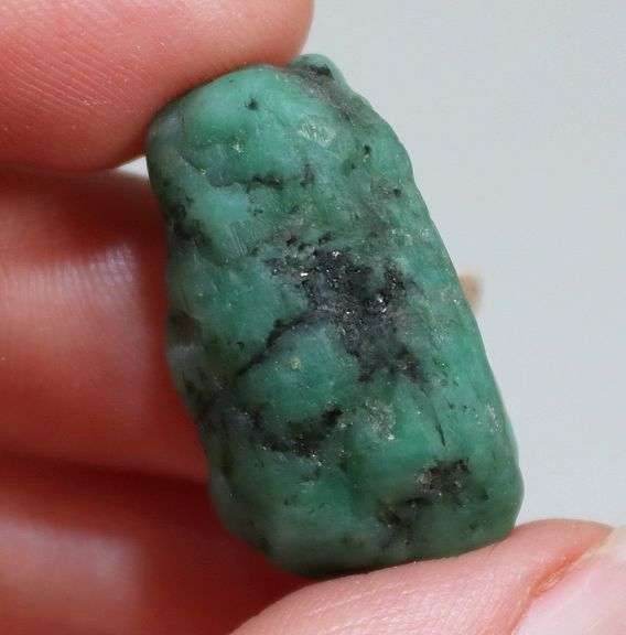 Large 37.81ct raw Emerald in matrix