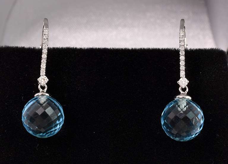 Amazing Blue topaz Dangle Earrings In 14K Yellow Gold