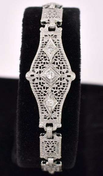 Elegant Diamond Fancy Link Bracelet In White Gold