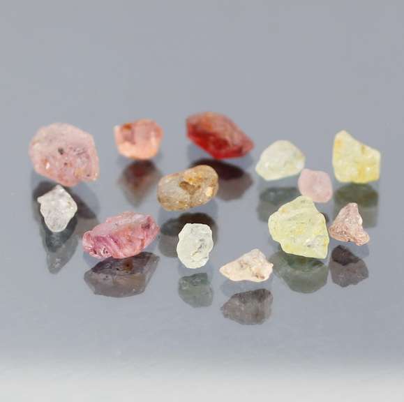 Mixed 13pc. 10.49ct unheated uncut Sapphire set