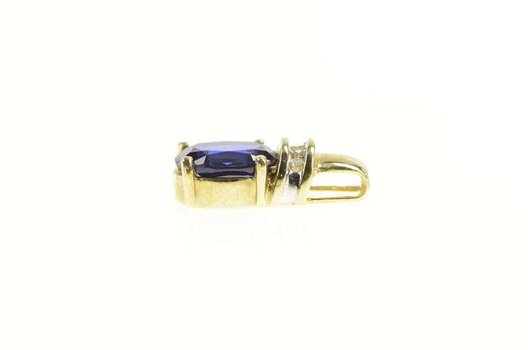 10K Yellow Gold Oval Syn. Sapphire Diamond Accent Classic Pendant
