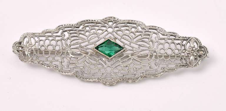Elegant Green Gemstone Pin In White Gold