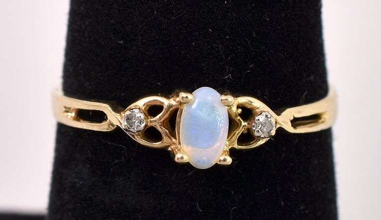 Delicate Opal Ring In Yellow Gold