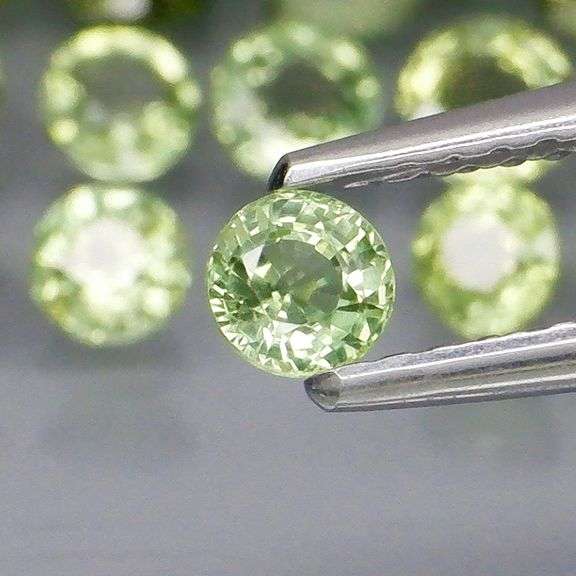 Fantastic 6.21ct diamond cut GREEN Sapphire set