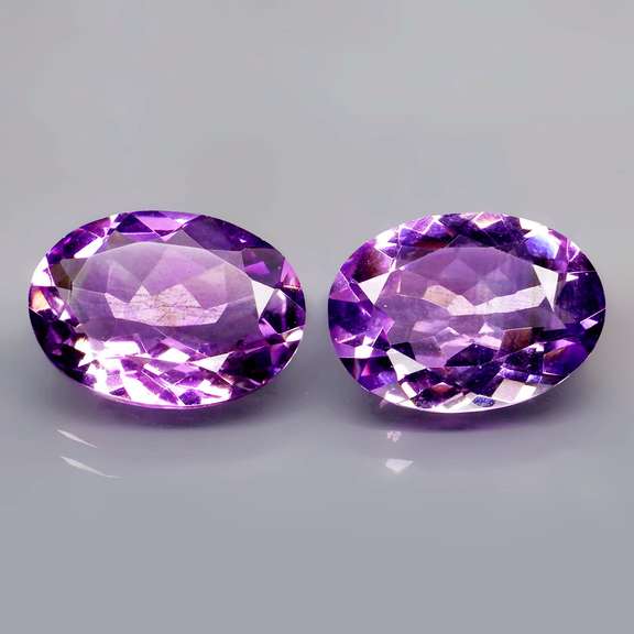 Glittering 9.93ct violet Amethyst pair