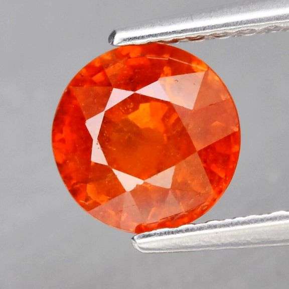Impressive 1.33ct mandarin orange Spessatite Garnet solitaire
