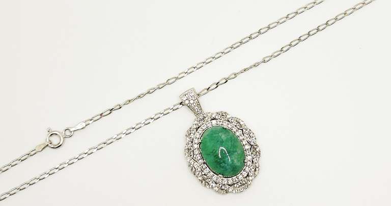 Stunning 10.0 Carat Oval Cabochon-Cut Emerald and Round White Sapphire Sterling Sliver Pendant Necklace.